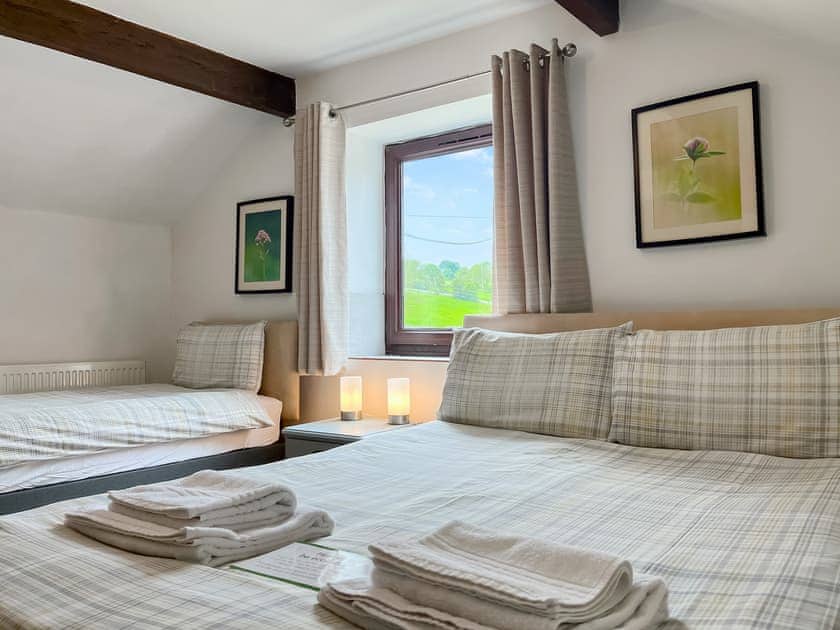 Double bedroom with additional single | Honeysuckle Cottage, Matlock