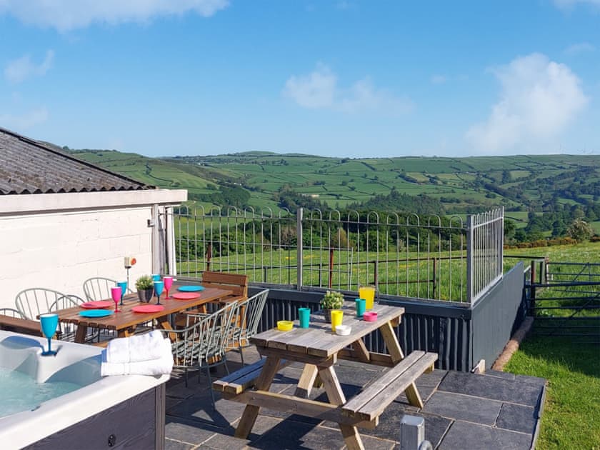 Spacious patio with hot tub and great views | Bryn Boda, Nantglyn, near Denbigh