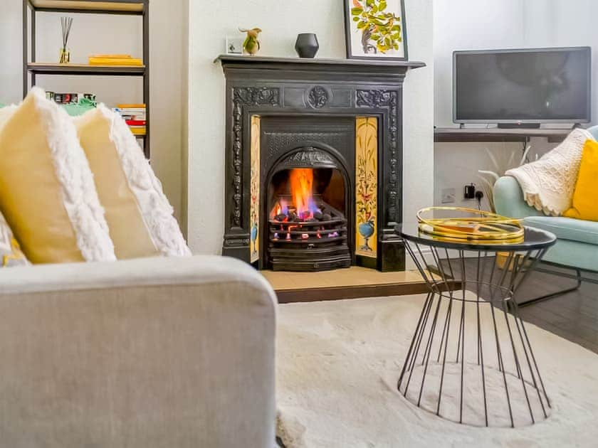 Cosy living room with feature fireplace | Shrewsbury Fields, Shifnal