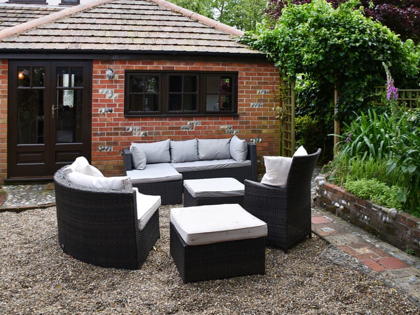 Outdoor area | Capri Cottage, Winterton-on-Sea