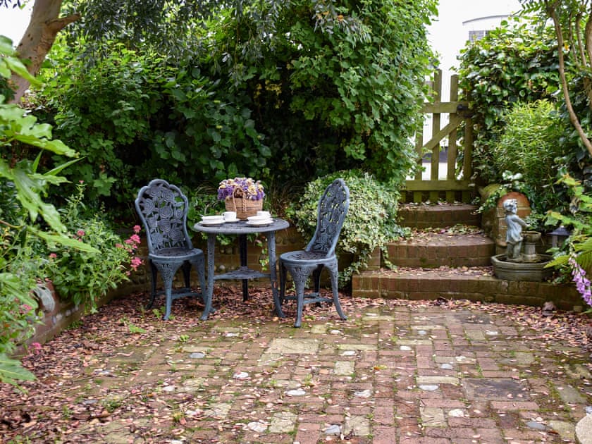 Outdoor area | Capri Cottage, Winterton-on-Sea