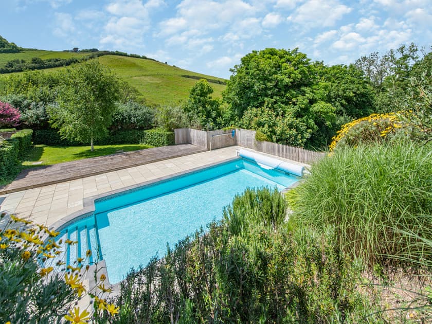 Swimming pool | Garden Apartment, Hallsands