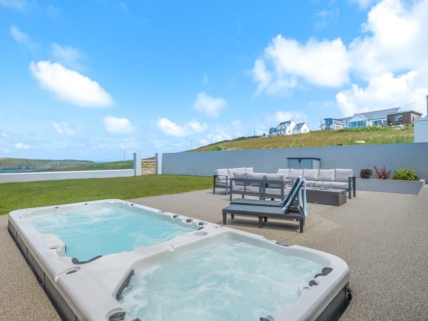 Hot tub | Ty Ynys - Gwbert Holiday Cottages, Gwbert, near Cardigan