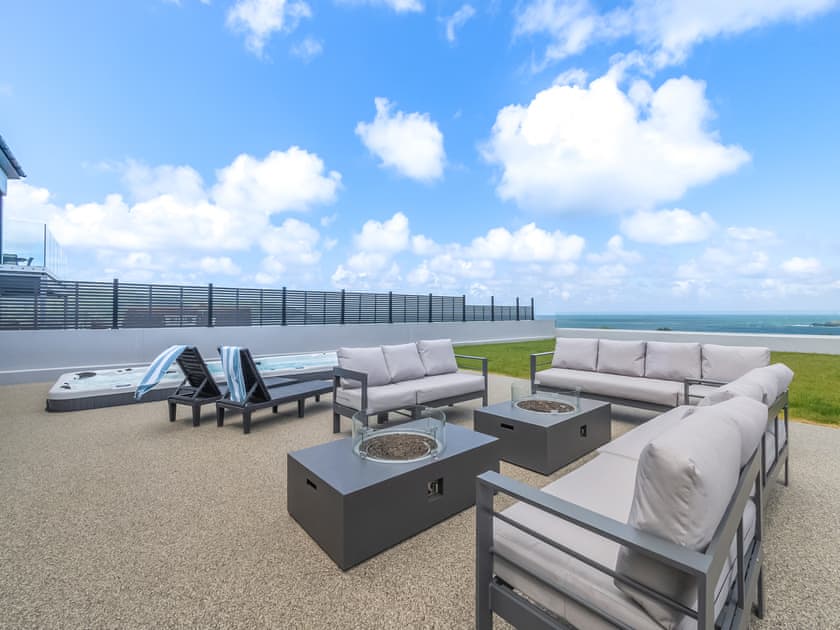 Sitting-out-area | Ty Ynys - Gwbert Holiday Cottages, Gwbert, near Cardigan