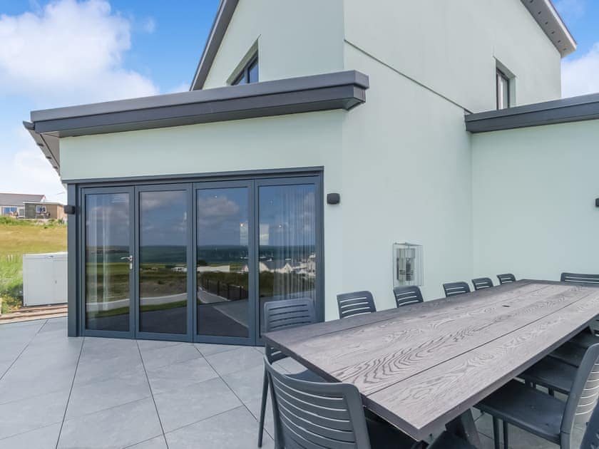 Sitting-out-area | Ty Ynys - Gwbert Holiday Cottages, Gwbert, near Cardigan