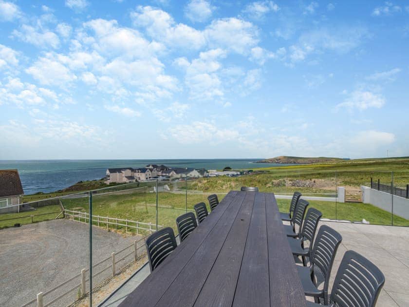 Sitting-out-area | Ty Mor - Gwbert Holiday Cottages, Gwbert, near Cardigan
