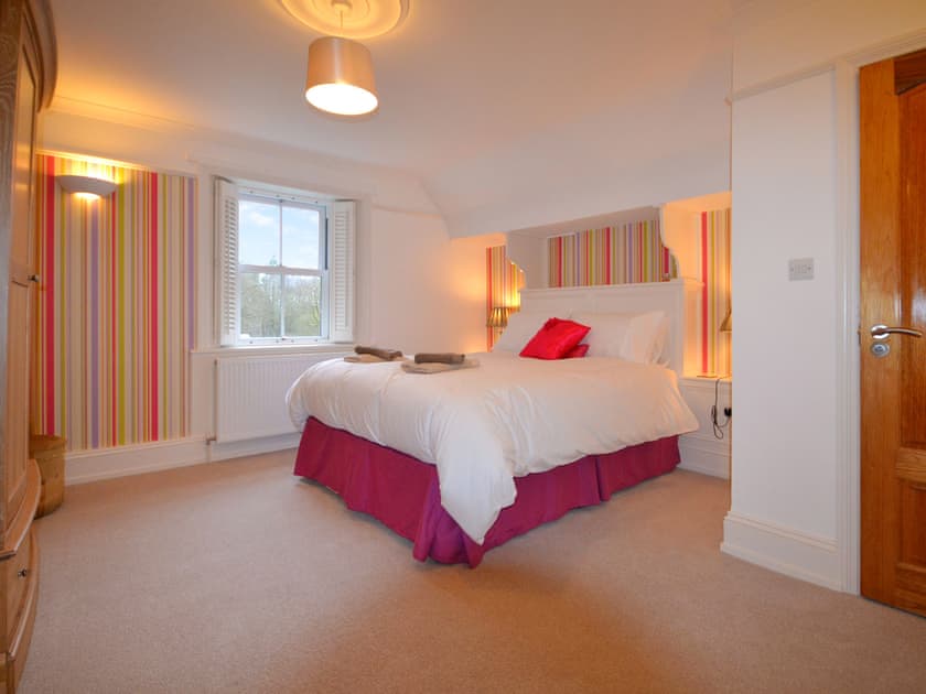 Contemporary bedroom with king-size bed | Ellerside, Cark, near Cartmel