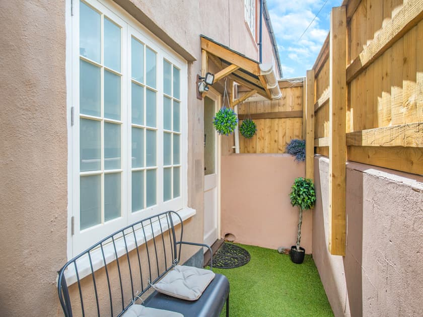 Outdoor area | Roosters Retreat - Subiaco Holidays, Minehead