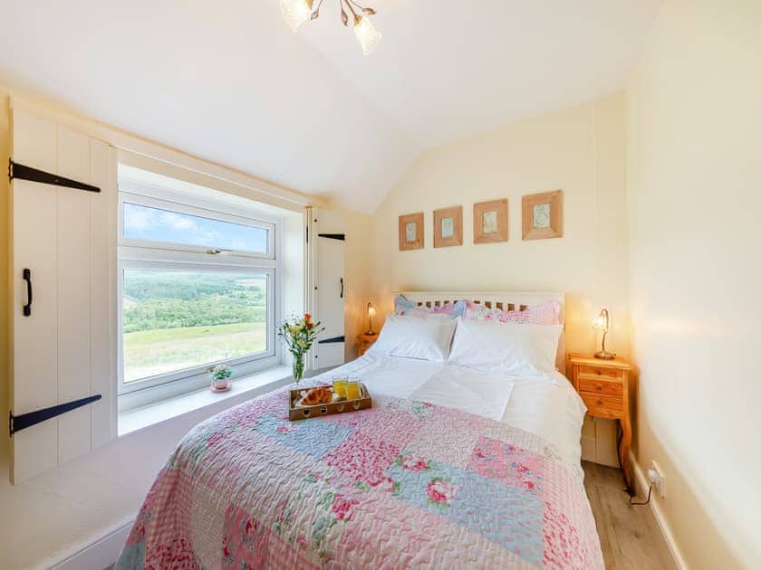 Cosy wood-floored double bedroom | Lake View Cottage, Yarrow Moor, near Bellingham