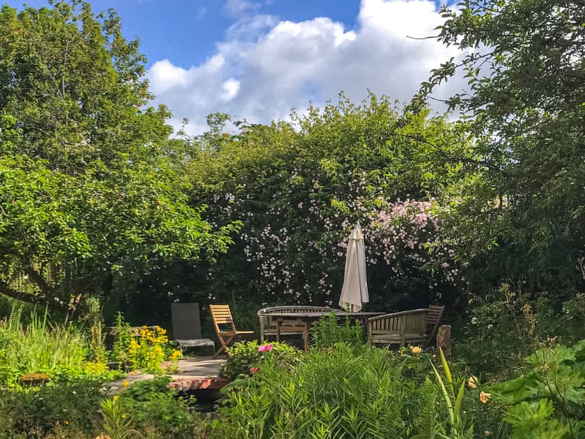The main house front garden - guests are welcome to use this space | Ynywsen Dairy Flat, Nantgaredig
