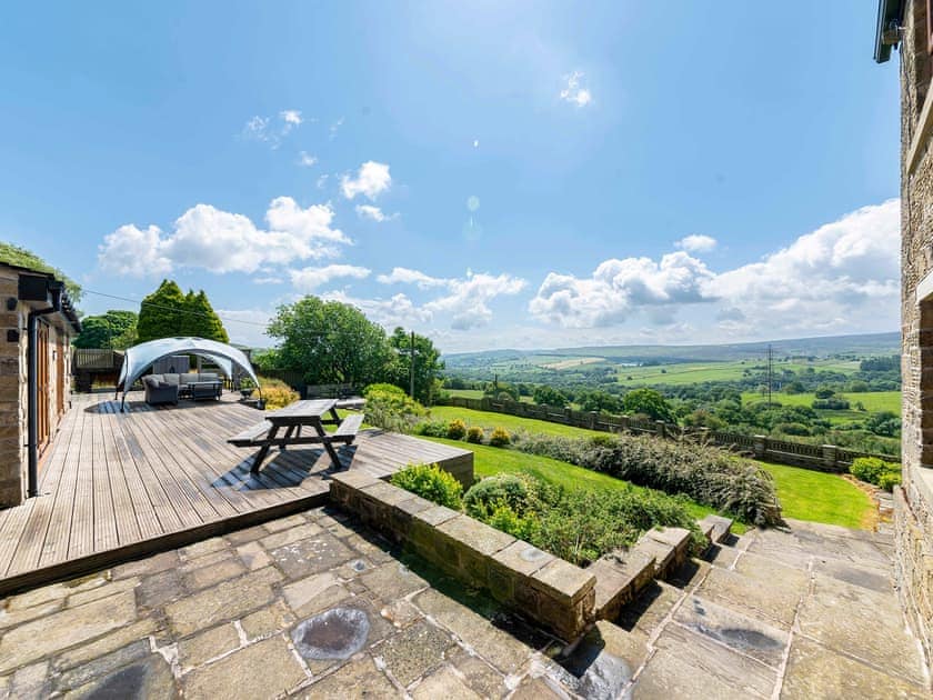 Lovely decked area with picnic-style seating | Cote Farm, Langsett, near Penistone