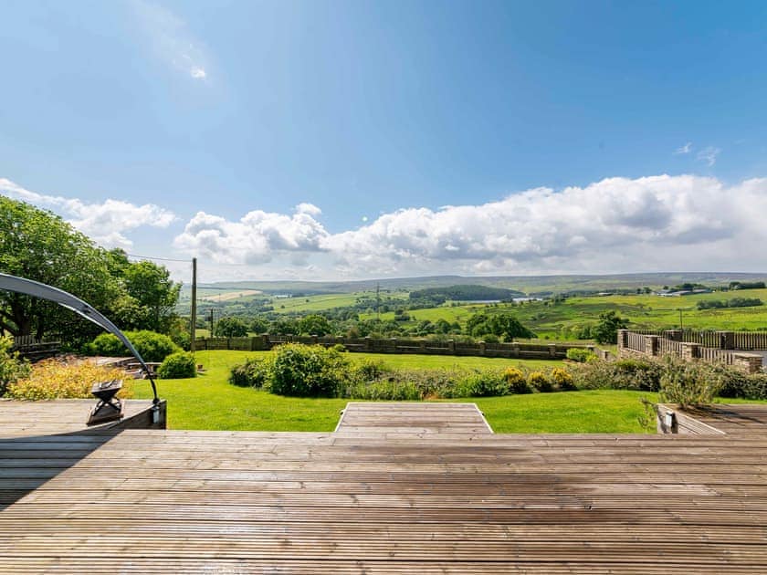 Lovely decked area with picnic-style seating | Cote Farm, Langsett, near Penistone