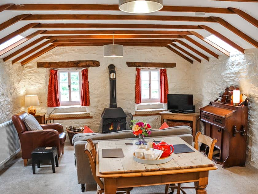 Living Room with wood burner | Rhydlanfair Cottage, Near Betws-y-Coed