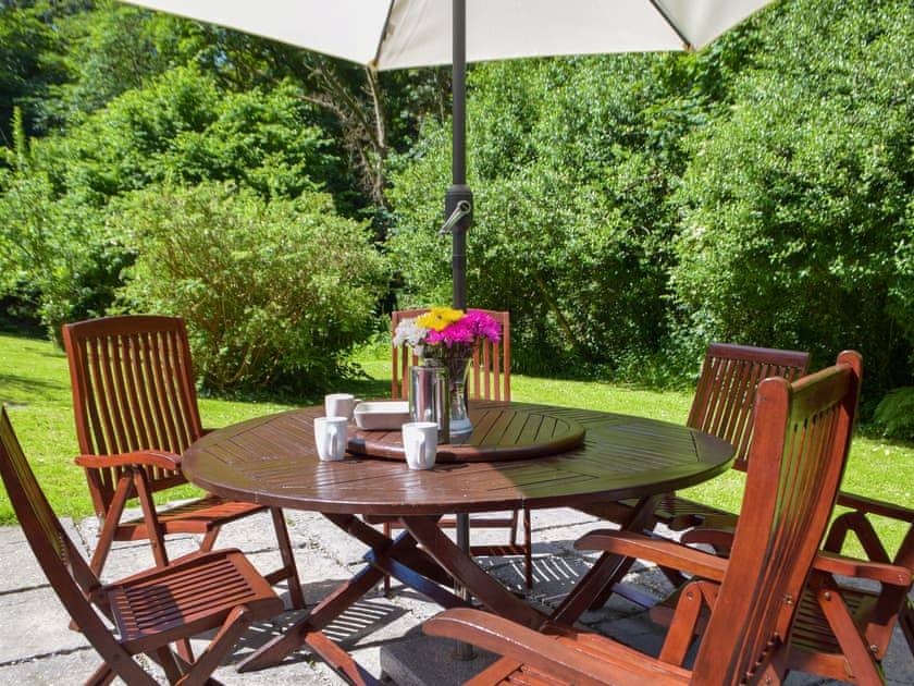 South facing patio dining  | Wood Cottage, Stackpole Cheriton, near Pembroke