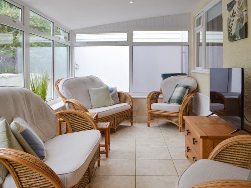 Sun room | Ffin Yr Afon - Gwbert Holiday Cottages, Gwbert, near Cardigan
