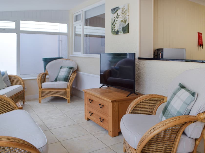 Sun room | Ffin Yr Afon - Gwbert Holiday Cottages, Gwbert, near Cardigan