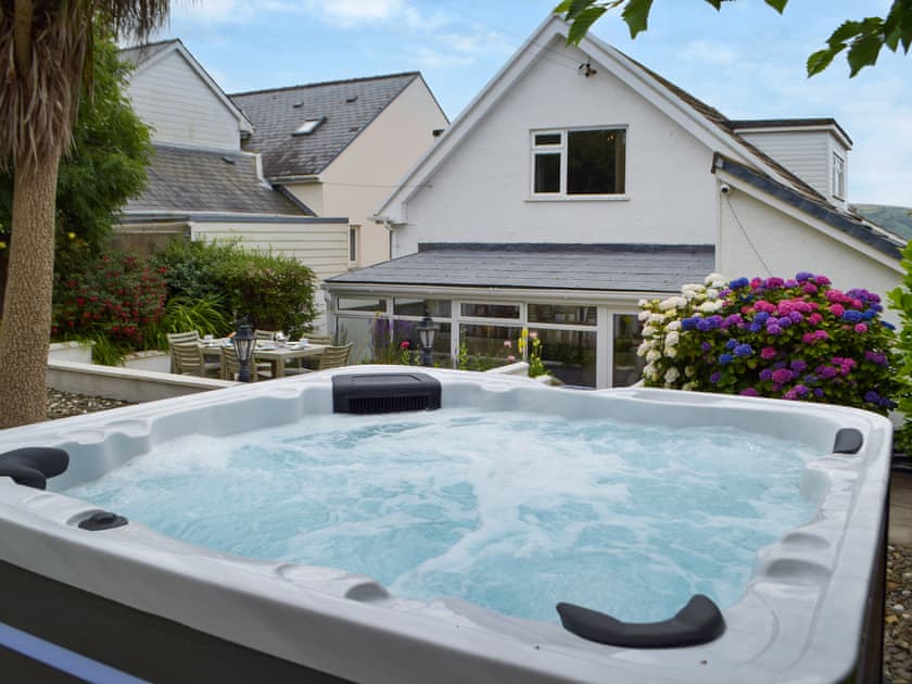 Hot tub | Ffin Yr Afon - Gwbert Holiday Cottages, Gwbert, near Cardigan