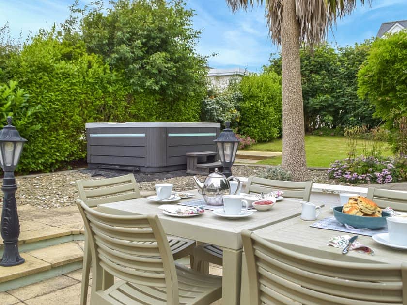 Sitting-out-area | Ffin Yr Afon - Gwbert Holiday Cottages, Gwbert, near Cardigan