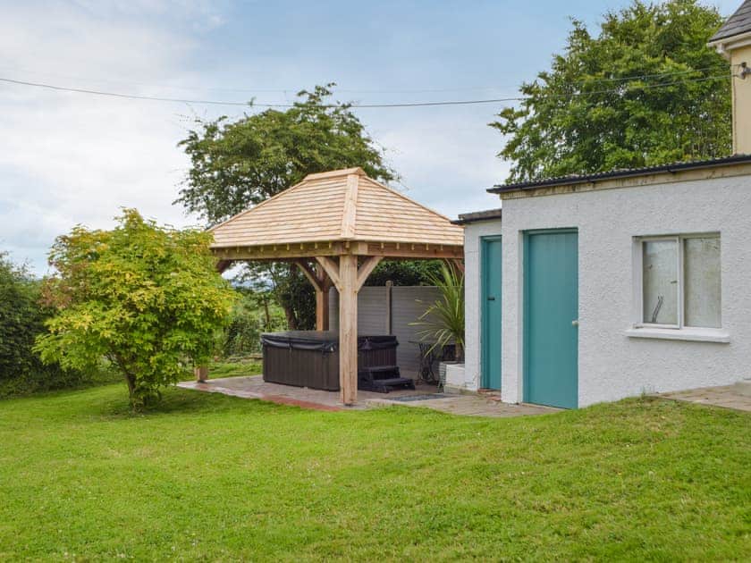 Jacuzzi | Gamekeepers Cottage, Newchapel, near Cardigan