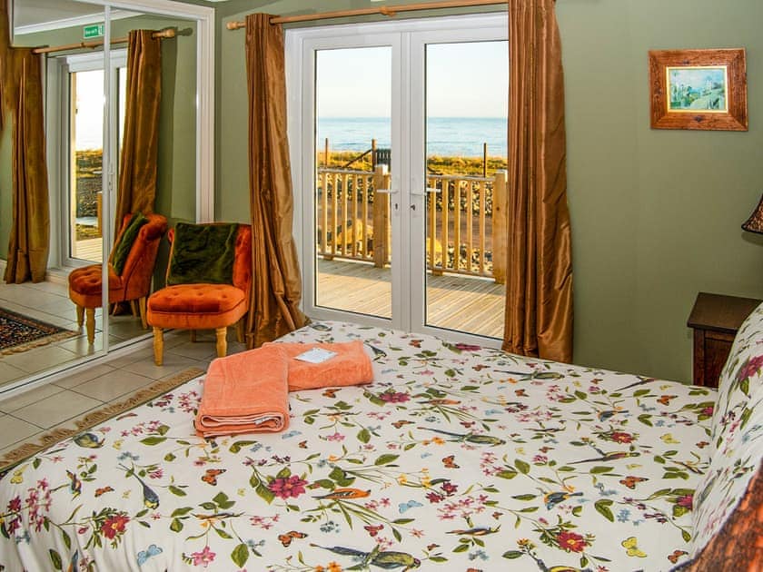 Main bedroom with king size bed | Lobster Ponds, Helmsdale