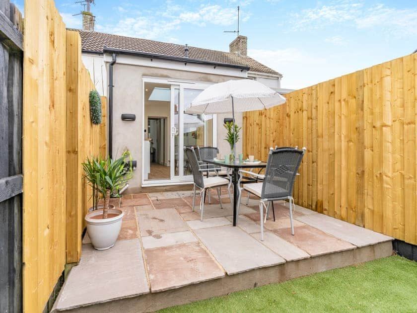 Patio | Wick Cottage, Porthcawl, near Swansea