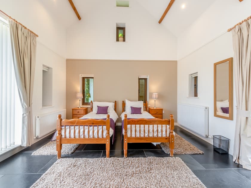 Twin bedroom | Rhandir Long House - Cennen Cottages at Rhandir Farm, Trapp, near Llandeilo