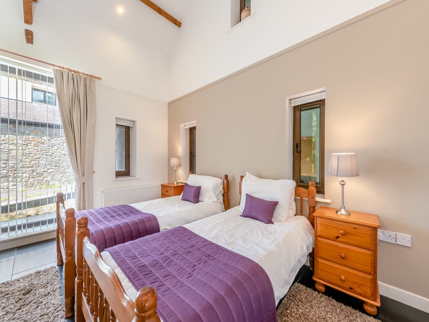 Twin bedroom | Rhandir Long House - Cennen Cottages at Rhandir Farm, Trapp, near Llandeilo