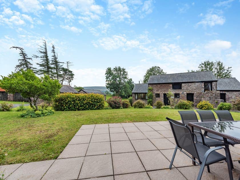 Sitting-out-area | Ysgubor Fawr - Cennen Cottages at Blaenllynnant, Gwynfe, Llangadog