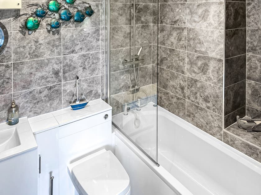 Newly fitted bathroom suite with shower over the bath | High Tide, Binfield, near Newport