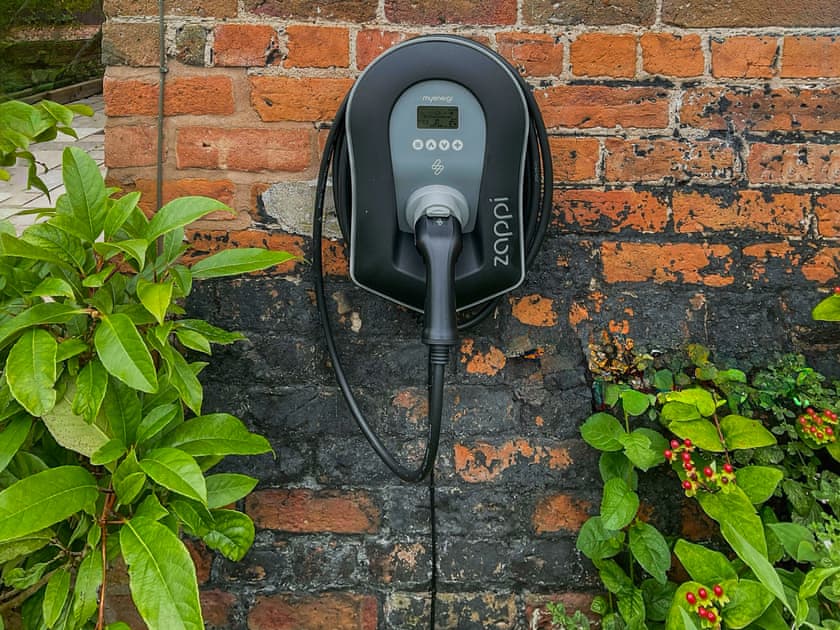 There is a charger for the car and mobility scooter - it is at a guest cost | The Coach House - Malpas Retreats, Tilston, near Malpas