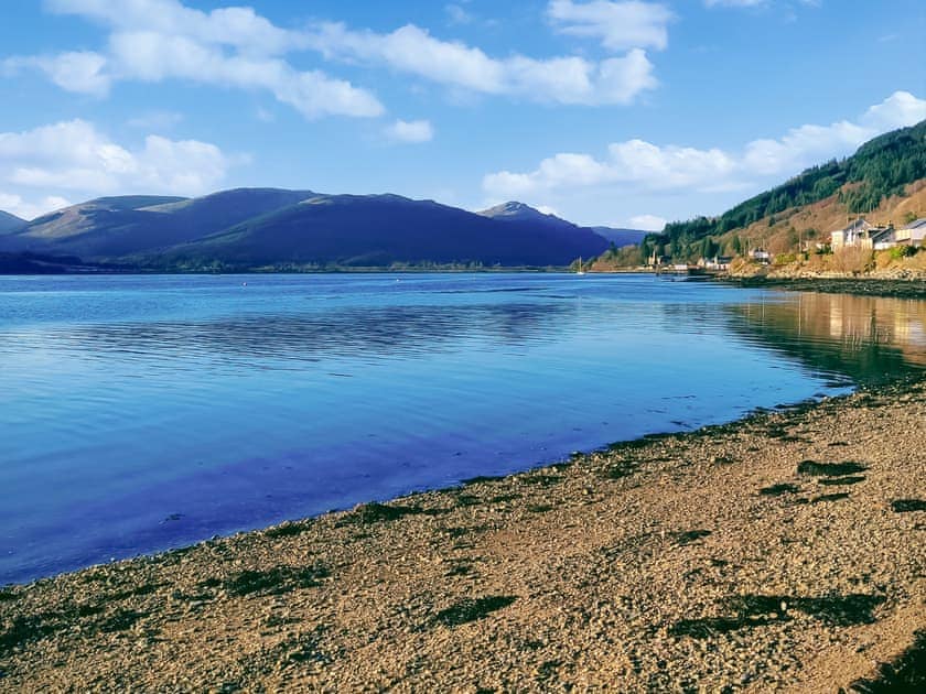Beach outside of the house is shingle and stones. Great views across the Holy Loch | Firwood Apartment, Kilmun, near Dunoon
