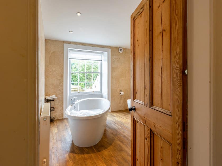 luxurious bathroom with free-standing bath | Thirley Cotes Farmhouse, Harwood Dale, near Scarborough
