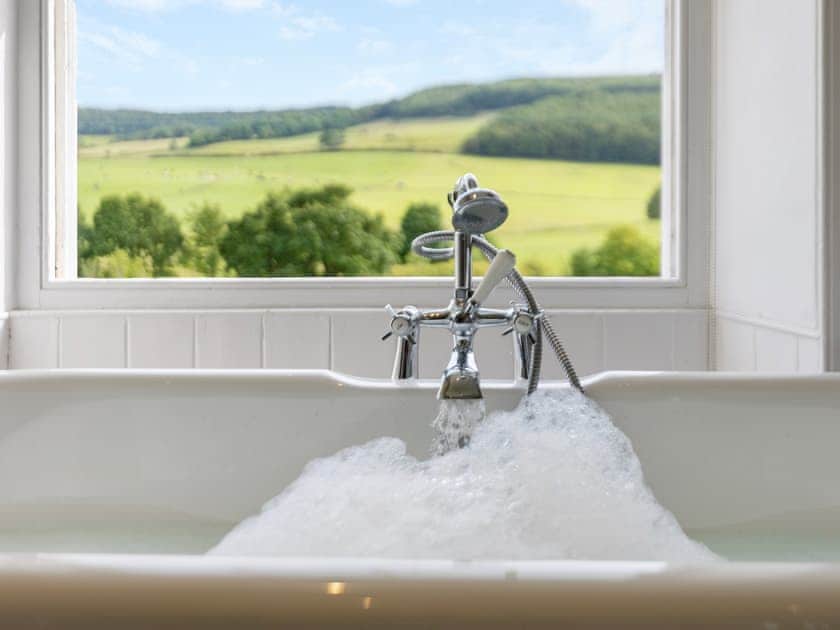 luxurious bathroom with free-standing bath | Thirley Cotes Farmhouse, Harwood Dale, near Scarborough