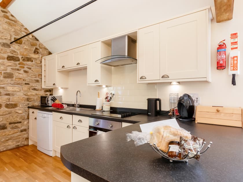 Well-equipped fitted kitchen | Holly Cottage, Harwood Dale, near Scarborough