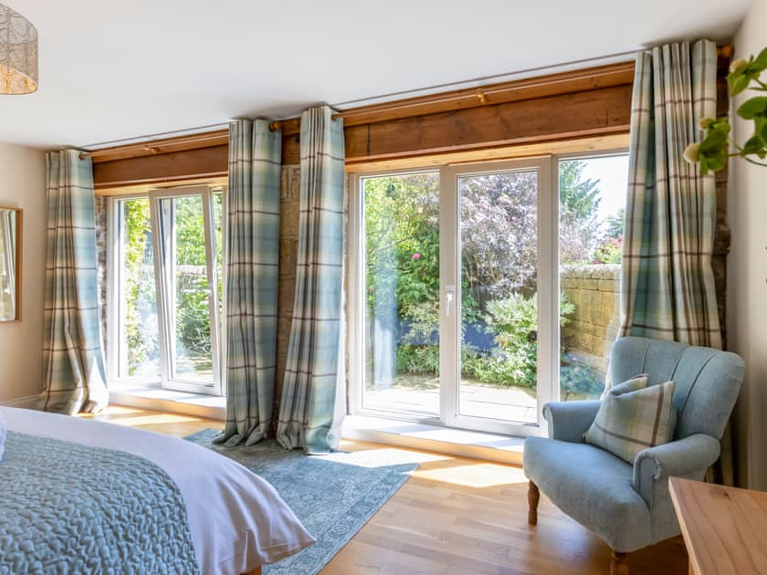 Relaxing bedroom with kingsized bed | Holly Cottage, Harwood Dale, near Scarborough