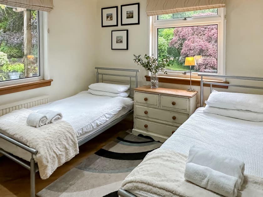 Side twin bedroom overlooking the garden courtyard | Tigh-na-Creige, Colintraive
