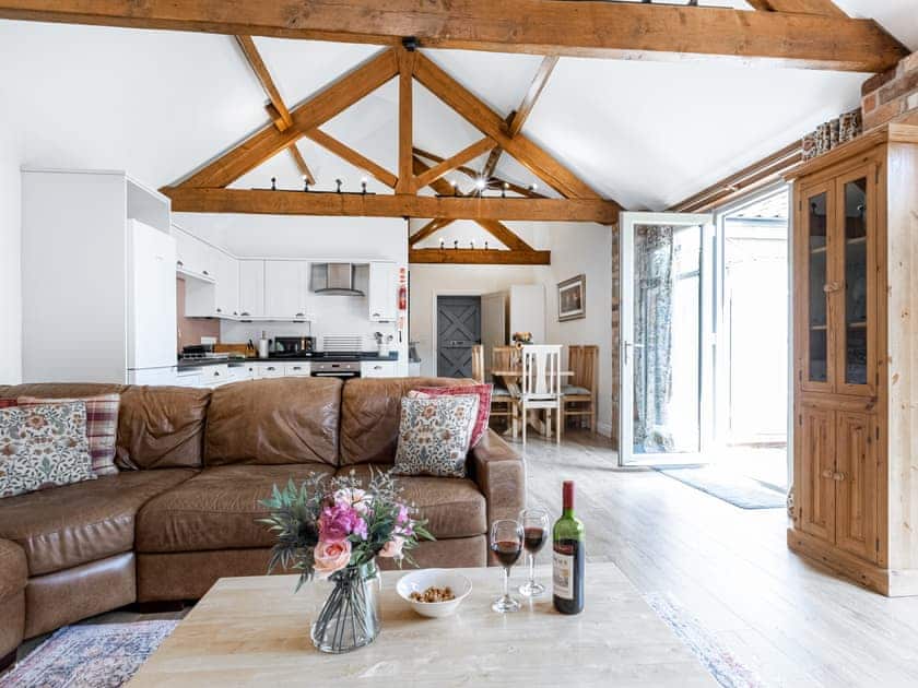 Living area with access to the patio | Willow Cottage, Harwood Dale, near Scarborough