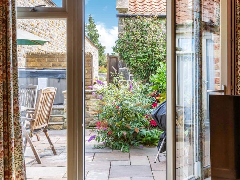 Living area with access to the patio | Willow Cottage, Harwood Dale, near Scarborough