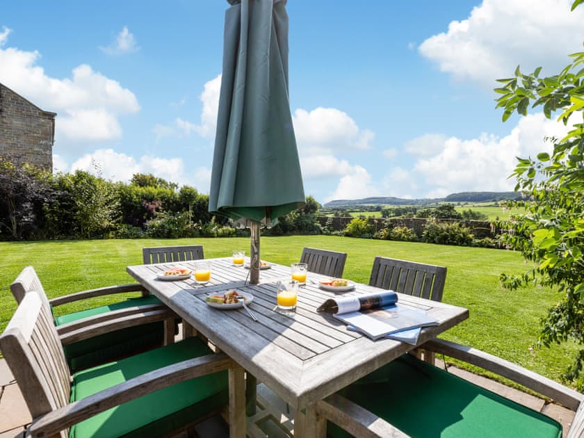 Outdoor furniture on the patio | Mulberry Cottage, Harwood Dale, near Scarborough