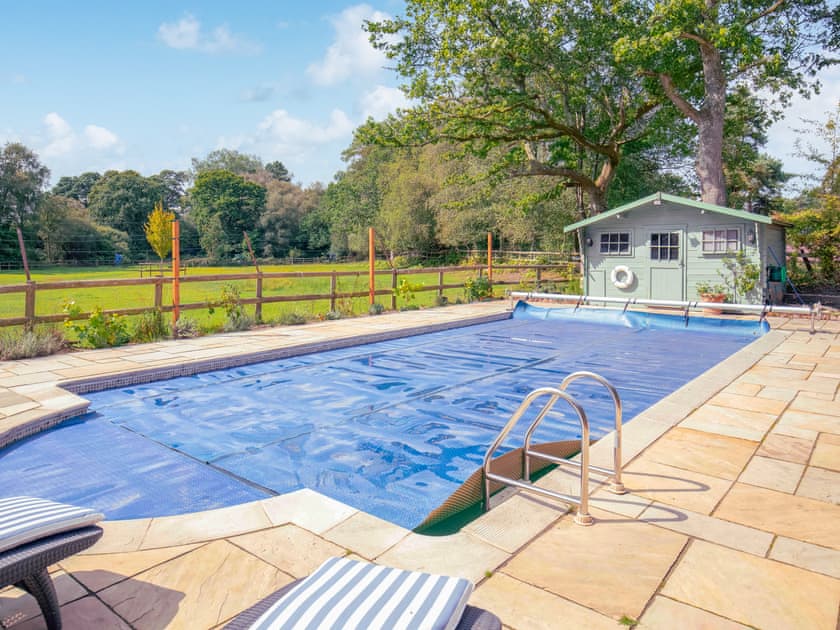 The swimming pool - open during the summer. Please contact property owner for dates. | The Cottage at Dockens Water, Linwood, near Ringwood