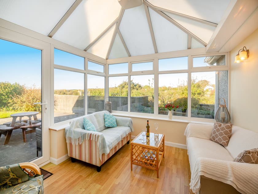 Sun room | Penyrorsedd Cottage, Llanfachraeth, near Trearddur Bay
