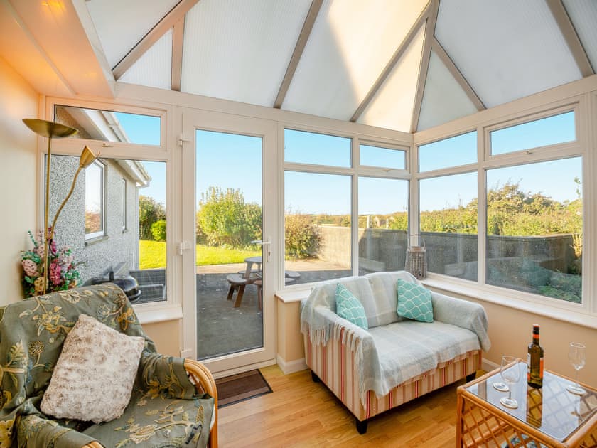 Sun room | Penyrorsedd Cottage, Llanfachraeth, near Trearddur Bay