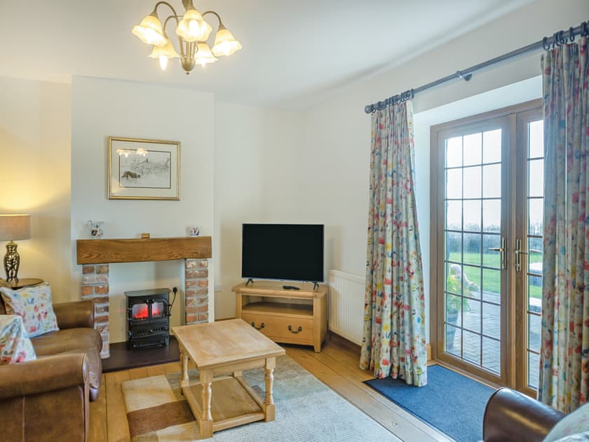 Living area | Siambr - Parc Wernol Cottages, Chwilog, near Pwllheli
