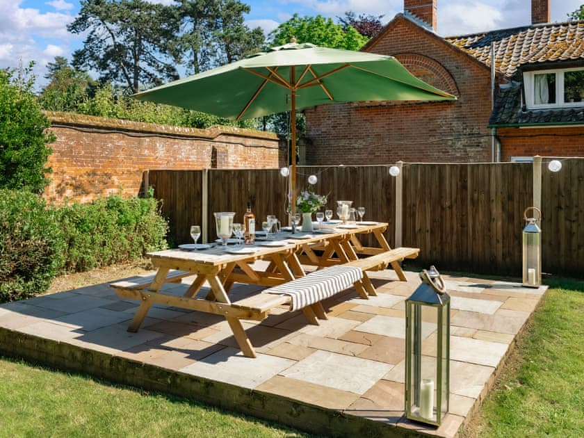 The large garden is an excellent place for alfresco dining | Hall Cottage, Gresham, near Sheringham