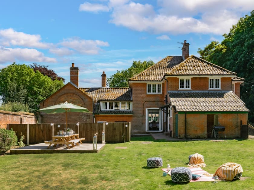 Situated in a sheltered and landscaped garden | Hall Cottage, Gresham, near Sheringham