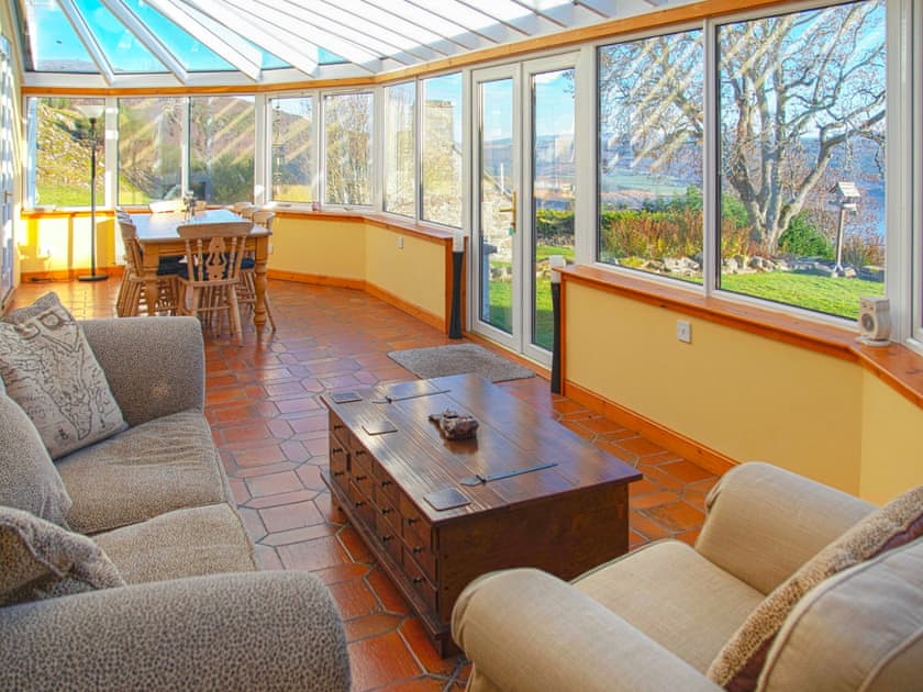 Conservatory with sitting and dining area  | Mor Carraig., Inverness