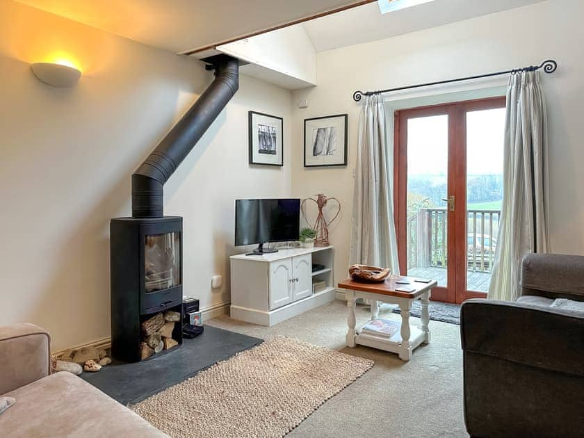 Light and airy living area with double doors to balcony | The Forge, Thorncombe, near Broadwindsor