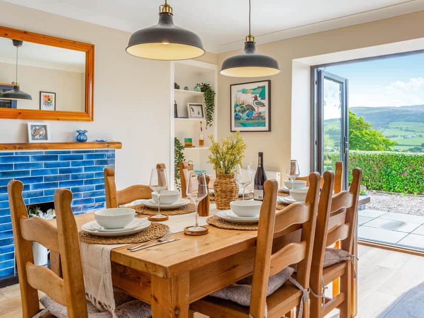 Dining room with patio doors opening onto the Garden | Greenhill, Blackwaterfoot