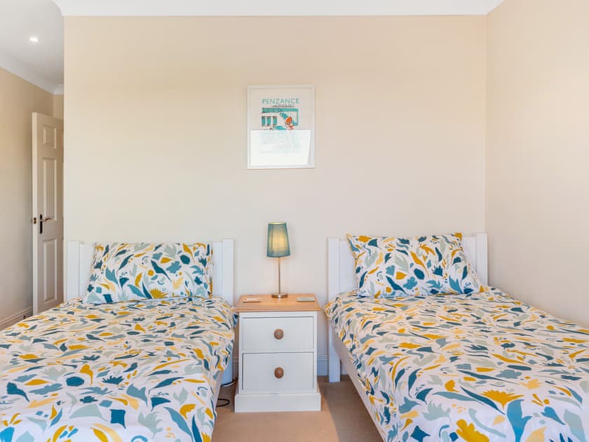 Twin bedroom | Troy Court, Fowey