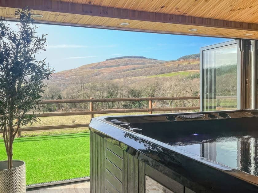 Hot tub | Bwthyn Cerrig - Crynant Cottages, Crynant, near Neath